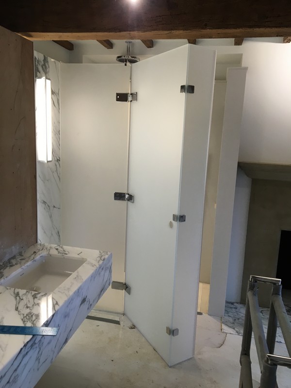 Bespoke frosted glass shower enclosure in Earl's Court luxury bathroom