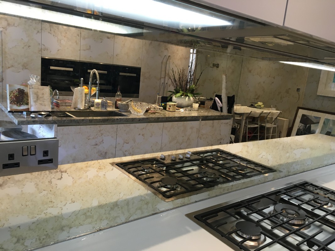 Mirror glass splashback in Earl's Court luxury kitchen